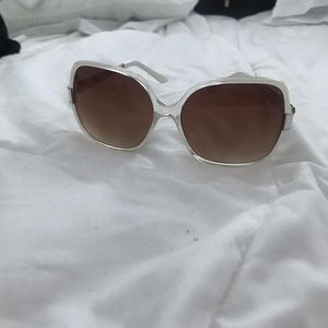 White Frame Sunglasses.